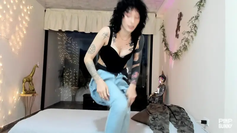 Curly-haired Latina Michelle Star strips & tries on different denim pants