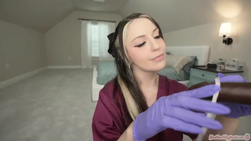 Heatherbby Rides A Black Dildo On Her Bed